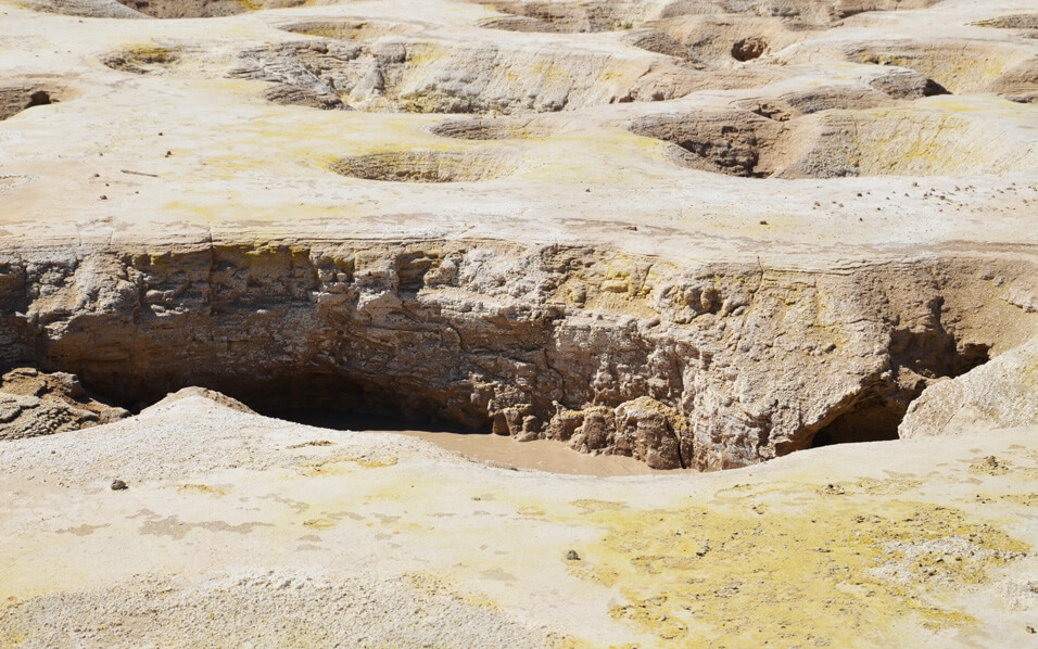 Hole of hot mud, within the crater.